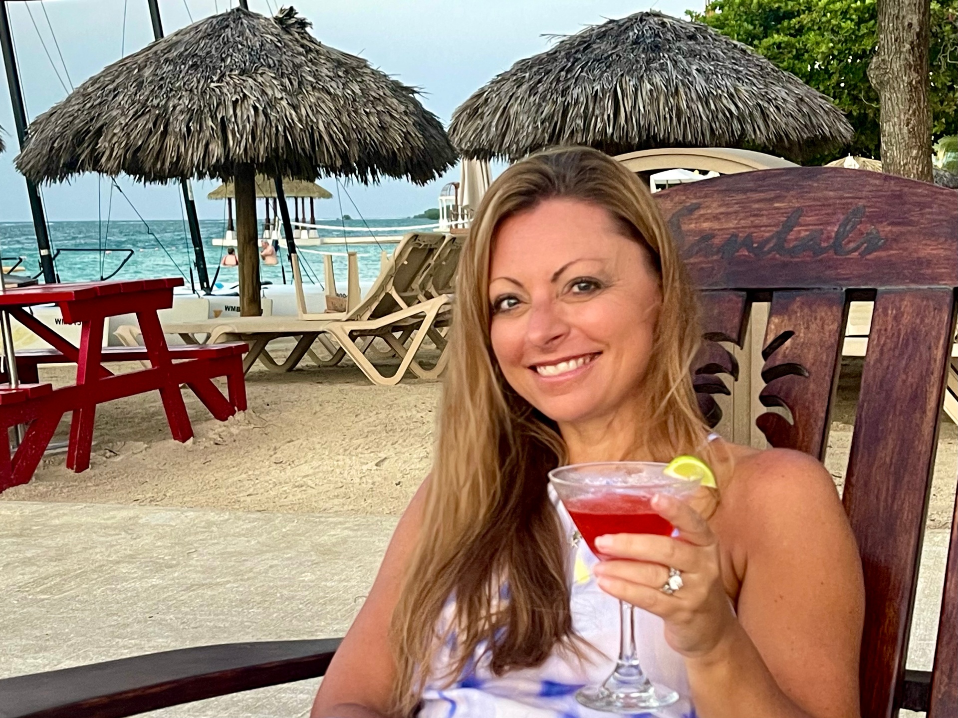Kristin Freeman reviewing a Sandals beachfront property